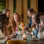 A group of friends at a dinner table